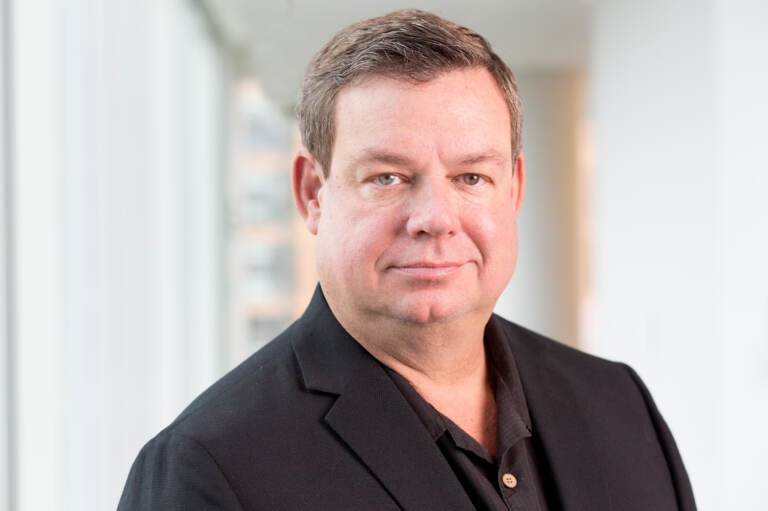 Wade Goodwyn reported for NPR for three decades and was known for his deep Texas bass and keen reporting observations and sharp writing. He's pictured here at NPR headquarters in Washington, D.C. in 2018.