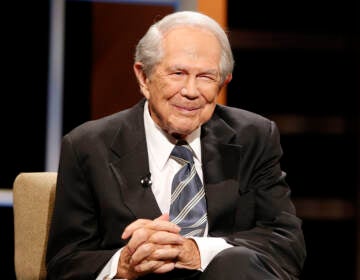 Pat Robertson speaks during a forum at Regent University in Virginia Beach, Va., in 2015. Robertson was a religious broadcaster who turned a tiny Virginia station into the global Christian Broadcasting Network, tried a run for president and helped make religion central to Republican Party politics in America through his Christian Coalition