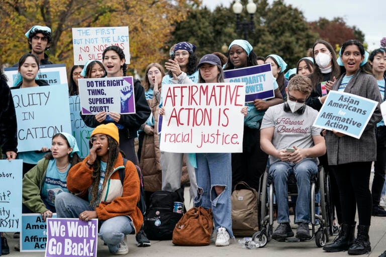 Activists demonstrate in front of the Supreme Court