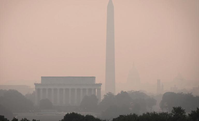 Hazy skies caused by Canadian wildfires blanket the monuments and skyline of Washington, D.C., on Wednesday.