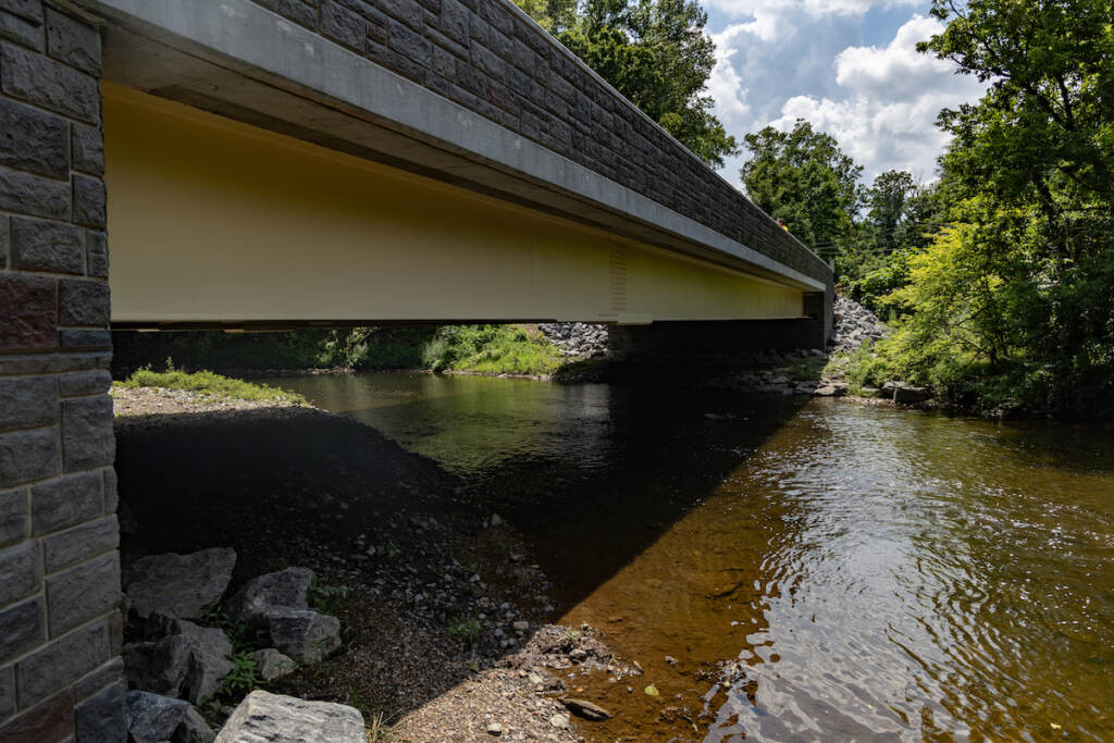 A view of the Mt. Alverno bridge stretching over Chester Creek
