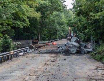 A damaged road is shown in Upper Makefield