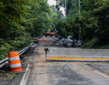 A damaged road is shown in Upper Makefield.