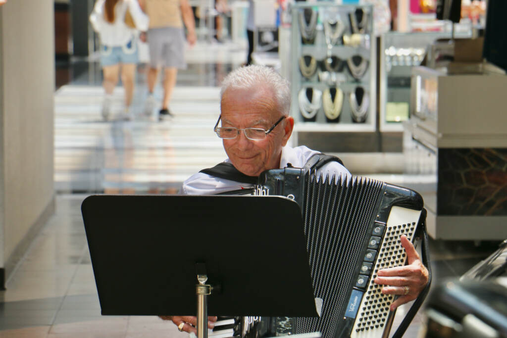 Frank Busso Sr. plays the accordion.