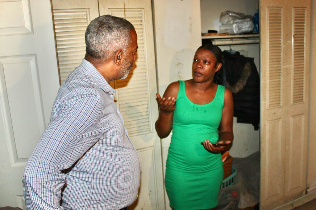 Camden Mayor Vic Carstarphen listens to Betzaida Kellum