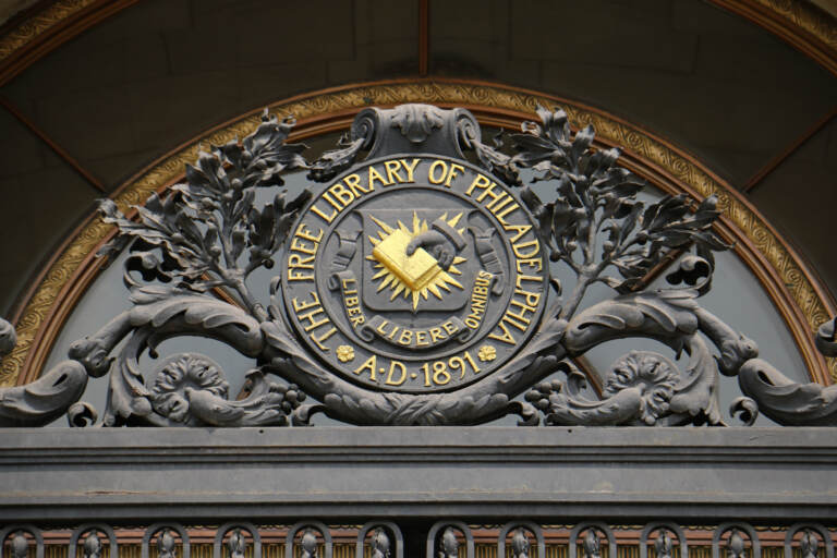 an emblem for the Free Library of Philadelphia Parkway Central Branch