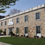 A view of the exterior of a brick building.