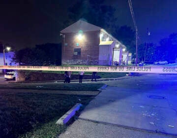 In this photo released by the Baltimore Police Department, police tape cordons off the area of a mass shooting incident in the Southern District of Baltimore, Maryland, early Sunday, July 2, 2023.