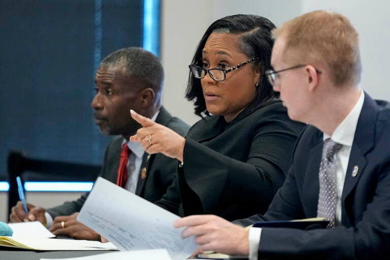 Fulton County District Attorney Fani Willis speaks in court in the Fulton county courthouse, Tuesday, July 11, 2023, in Atlanta. A grand jury being seated Tuesday in Atlanta will likely consider whether criminal charges are appropriate for former President Donald Trump or his Republican allies for their efforts to overturn his 2020 election loss in Georgia.