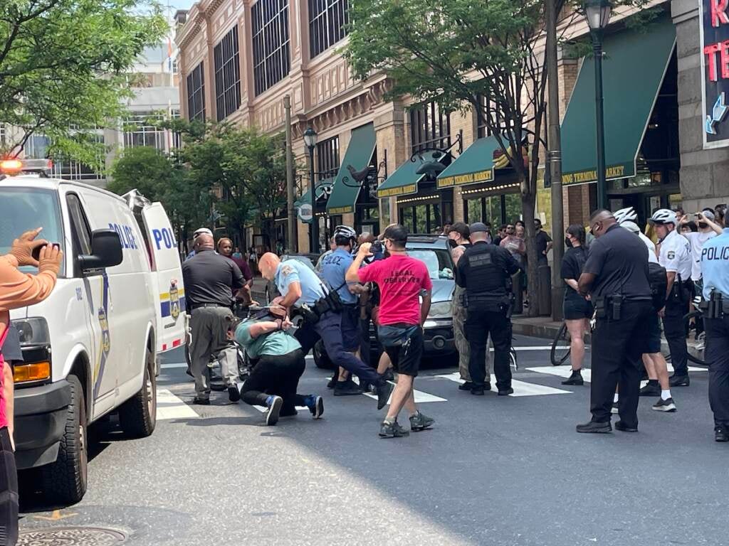 Multiple arrests were made this weekend during Moms For Liberty Summit protests, including six on Sunday for blocking traffic outside of the Marriott Hotel in Center City. (Nico Wesler, Courtesy of ACT UP Philadelphia)