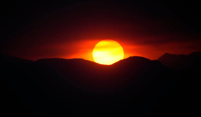 sunset-big-orange-sun-setting-over-ocean_0 - Truck News