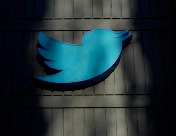 A sign at Twitter headquarters is shown in San Francisco on Nov. 18, 2022.