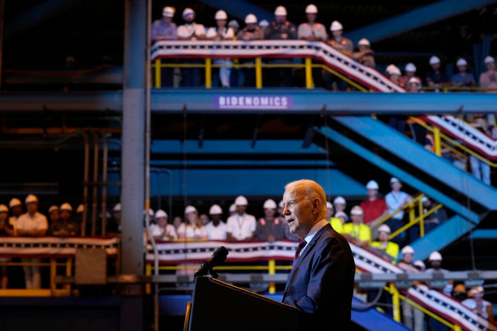 President Joe Biden speaks at a podium