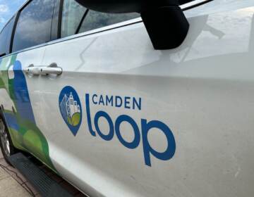 A close-up of a van emblazoned with the words Camden Loop