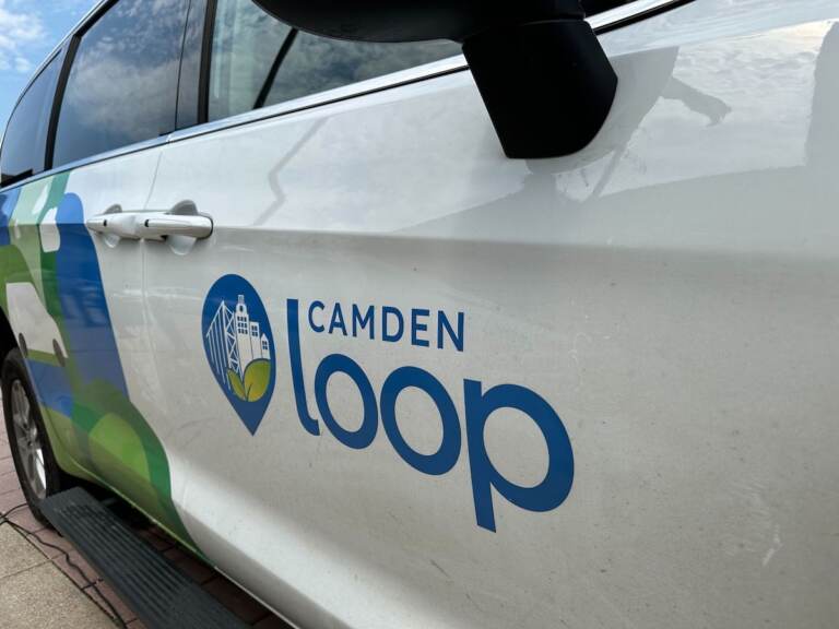 A close-up of a van emblazoned with the words Camden Loop