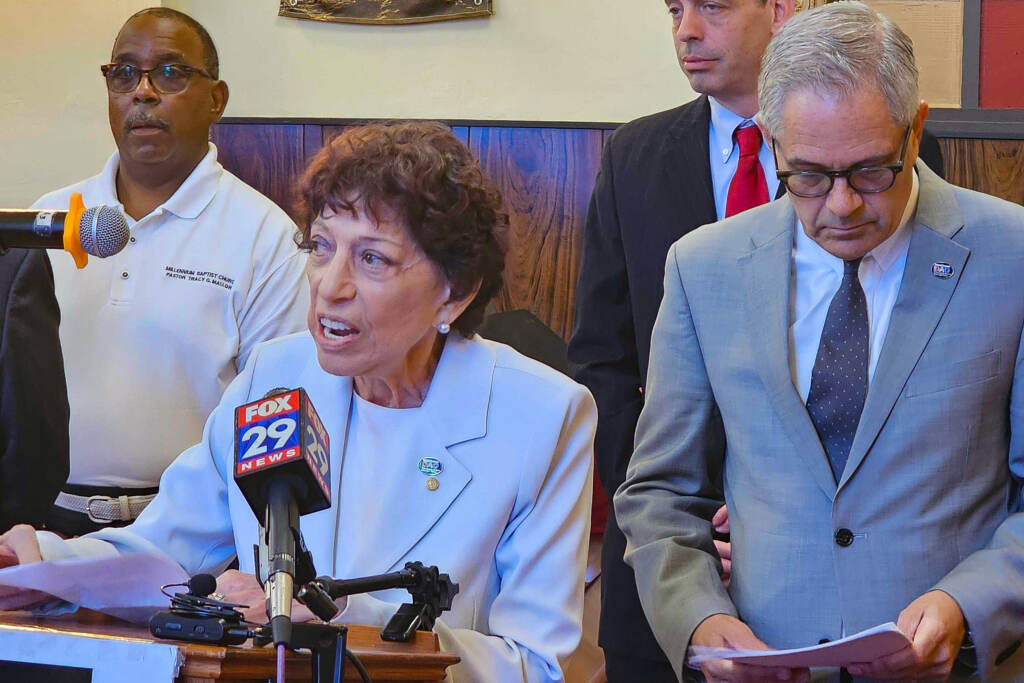 Carolyn Engel Temin speaking at a podium