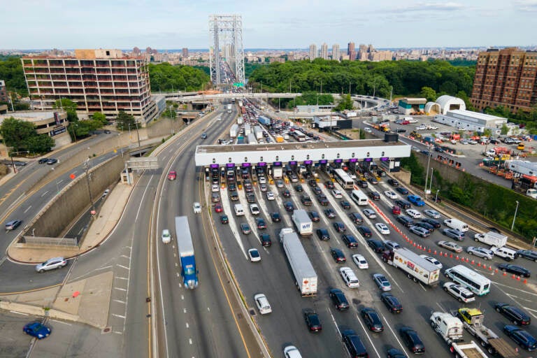 Cars lined up at a toll booth