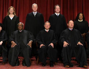 U.S. Supreme Court justices pose for a photo in 2022.
