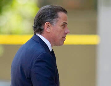 Closeup photo of Hunter Biden walking into a building