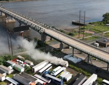 A tanker fire is seen from above by the Tacony-Palmyra Bridge in Philadelphia.