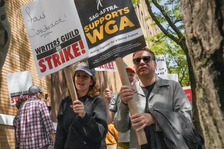 Tina Fey and Fred Armisen on the picket line