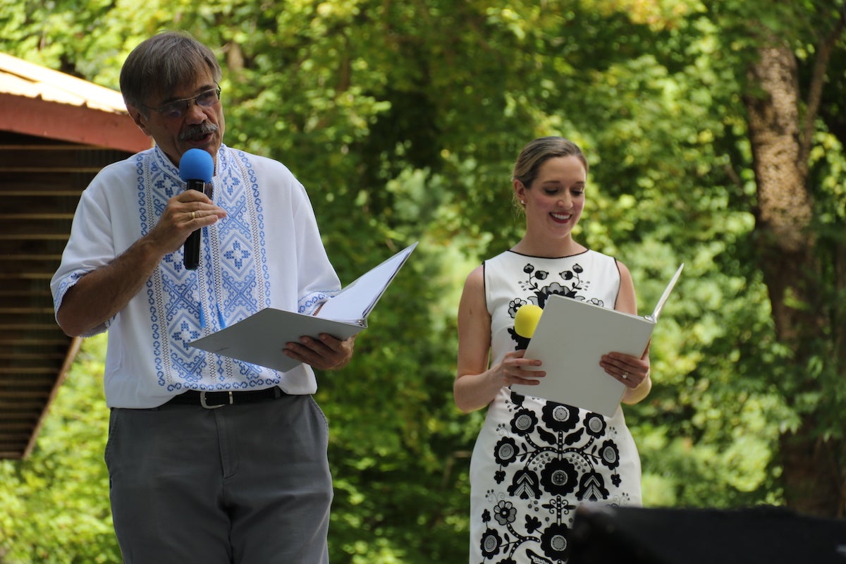 Eugene Luciw (left) served as the emcee for the Ukrainian Folk Festival. (Cory Sharber/WHYY)