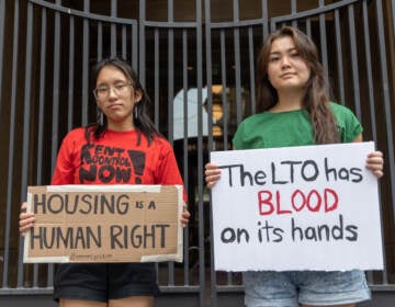 File photo: Janna Goliff, communications team co-lead (left) and Hanae Togami, member (right) with the Renter’s Justice Campaign protested the Landlord Tenant Office outside the municipal court building in Philadelphia on August 21, 2023. (Kimberly Paynter/WHYY)