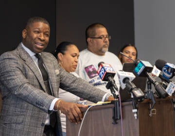 Philadelphia criminal attorney Shaka Johnson called into question information released by Philadelphia police about the shooting of 27-year-old Eddie Irizarry at a press conference with Irizarry’s family on Aug.22, 2023. (Kimberly Paynter/WHYY)