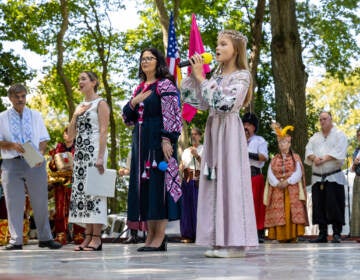 Before the ceremony at the Ukrainian Folk Festival in Horsham, Pa., both the national anthems of the United States and of Ukraine were sung on August 27, 2023. (Kimberly Paynter/WHYY)