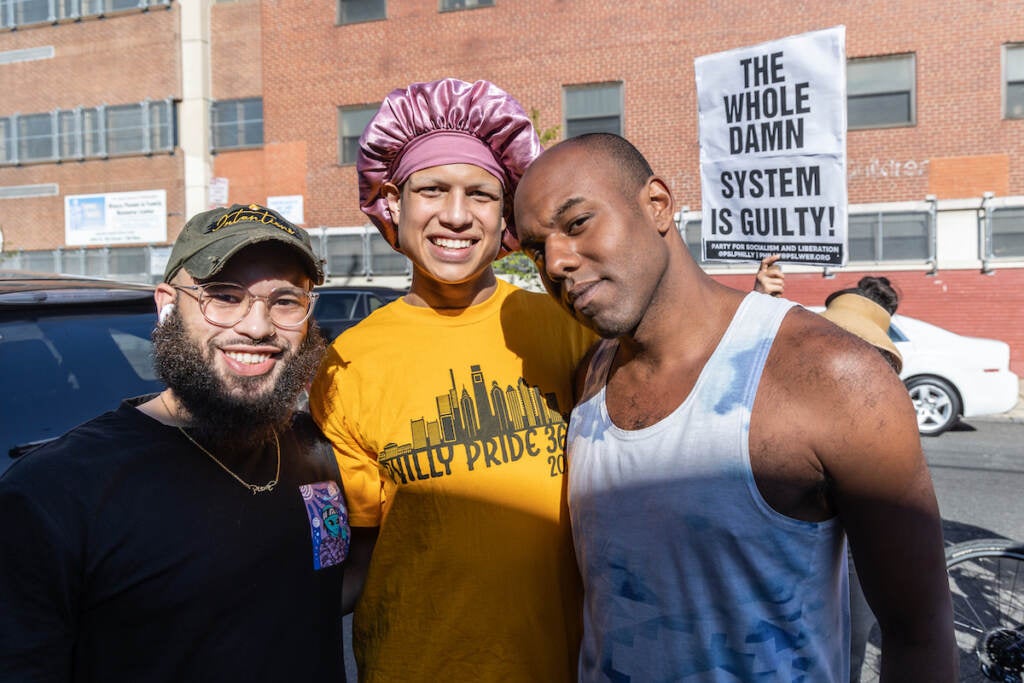 Jorian Rivera-Veintidos (left), Allyria Vasquez (center), and Diamond Anthony (right) stand together, posing for a photo