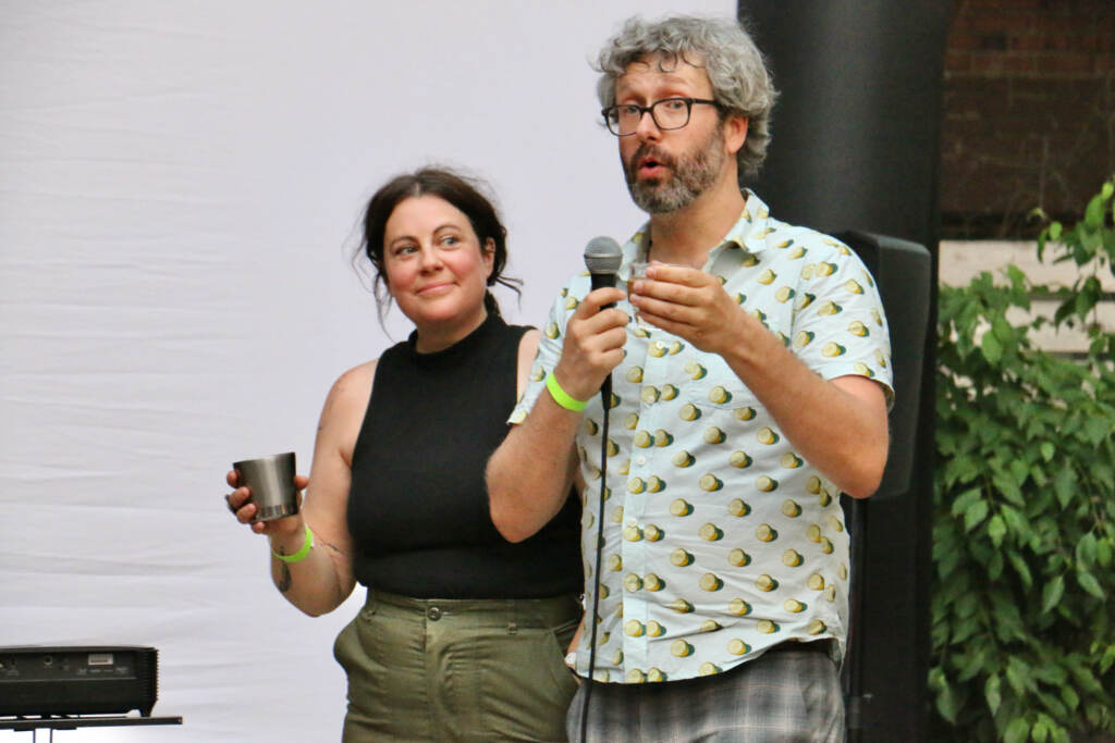 Emily Gallagher and her husband, Austin Elston, partners in Fishtown Films, speak before a screening