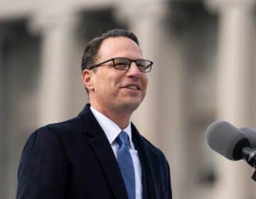 Josh Shapiro speaking at a podium