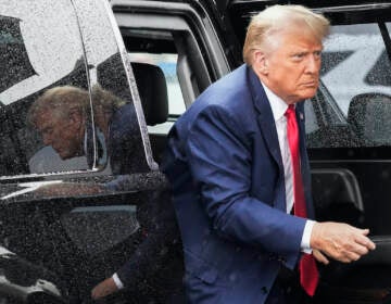 Former President Donald Trump arrives to board his plane at Ronald Reagan Washington National Airport, Aug. 3, 2023, in Arlington, Va., after facing a judge on federal conspiracy charges that allege he conspired to subvert the 2020 election