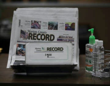 The last printed issue of the Marion County Record sits in a display in its office, Sunday, Aug. 13, 2023, in Marion, Kan.