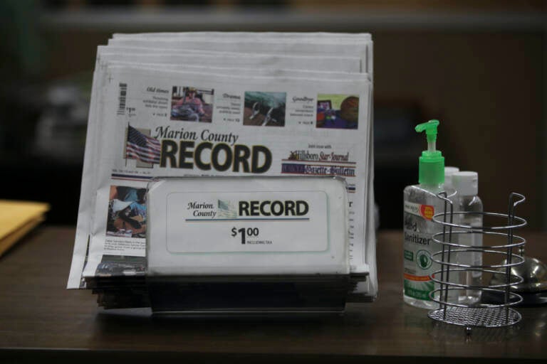 The last printed issue of the Marion County Record sits in a display in its office, Sunday, Aug. 13, 2023, in Marion, Kan.