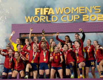 Team Spain celebrates after winning the Women's World Cup soccer final against England at Stadium Australia in Sydney, Australia, Sunday, Aug. 20, 2023