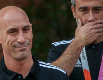President of Spain's soccer federation, Luis Rubiales (left) stands next to Spain Head Coach Jorge Vilda after their World Cup victory at La Moncloa Palace in Madrid, Spain, Tuesday, Aug. 22, 2023
