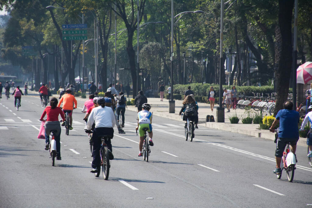 Bikers ride along Paseo de la Reforma in Mexico City. The avenue is closed to traffic on Sunday mornings. (Alan Jinich/WHYY).