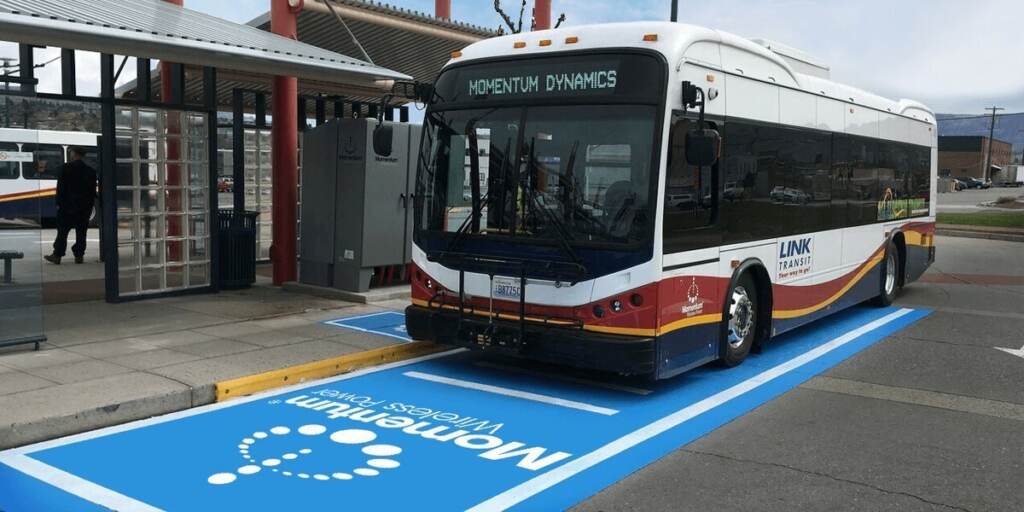 An all-electric bus in Wenatchee, Washington is charging wirelessly at a bus stop.