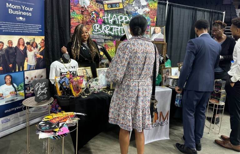 A Brewerytown business development group Mom Your Business listened to attendees at the National Black Business Expo in Philadelphia. (Kristen Mosbrucker-Garza/WHYY)