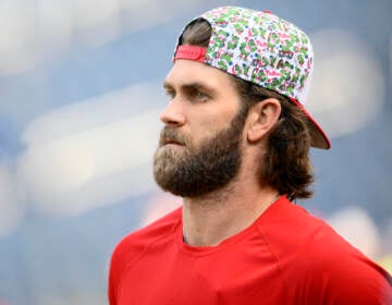 Bryce Harper looks on before a baseball game against the Washington Nationals