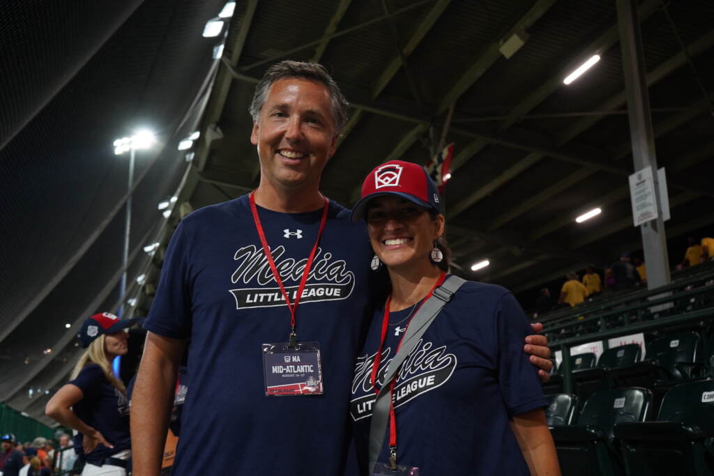 Rob Haenn and Paola Haenn pose for a photo at the Little League World Series
