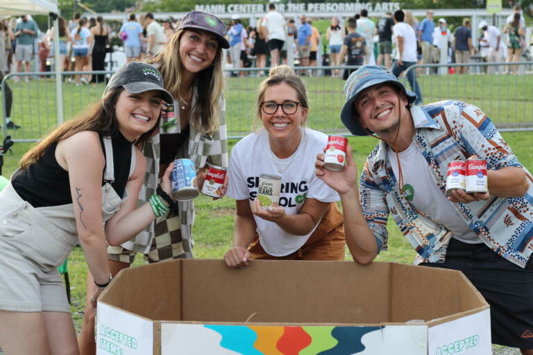 Sharing Excess accepted food donations outside of The Mann Center on Aug. 12 and 13 ahead of Mt. Joy's two-night stint at the venue. (Credit Cory Sharber/WHYY)