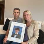 Anthony Allegrini Sr. and Jennifer Allegrini hold a photo of their son, Anthony Allegrini Jr.