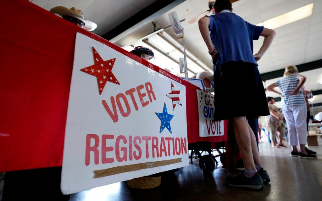 A voter registration table is seen at a political event on Aug. 17, 2022, in Fredericksburg, Texas.