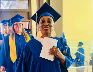 Betty Williams in her graduation cap and gown.