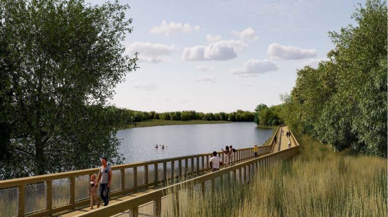 A rendering shows a bike trail along a river.