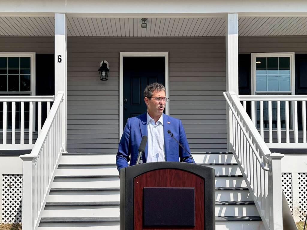 New Castle County’s executive Matt Meyer speaks at a podium