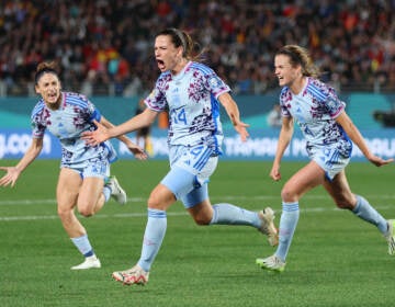 Spain's Laia Codina (center) celebrates with teammates Esther Gonzalez (left) and Irene Paredes (right) after scoring her team's fourth goal on Switzerland during the round of 16. (Buda Mendes/Getty Images)