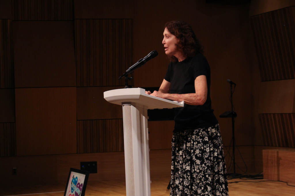 Jane Golden speaks at a podium.